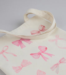 About A Girl Bow Canvas Tote Bag